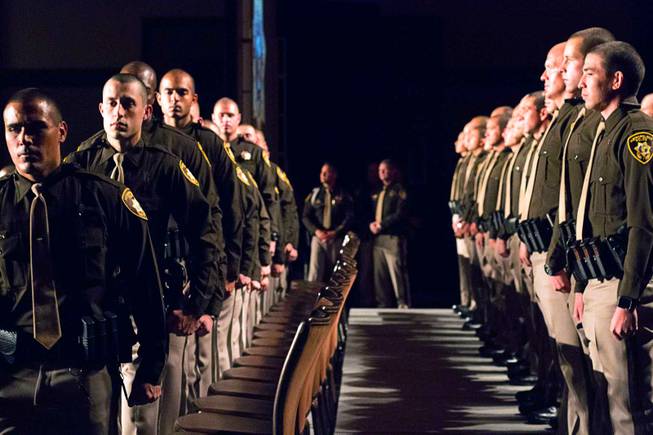 Las Vegas Metro Police recruits stand during a graduation ceremony at Red Rock Resort Thursday April 13, 2017.  Seventy recruits graduated the academy.