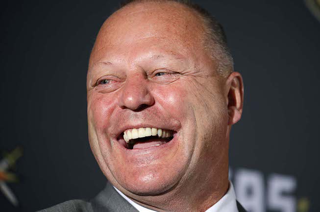 Gerard Gallant laughs during a news conference Thursday, April 13, ...