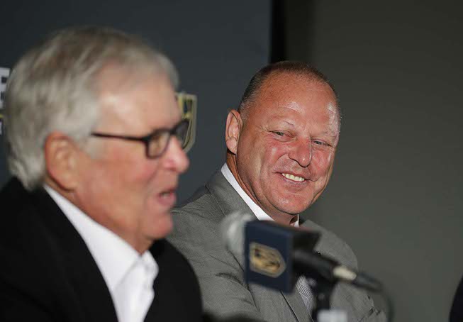 Gerard Gallant, right, attends a news conference with Bill Foley, ...