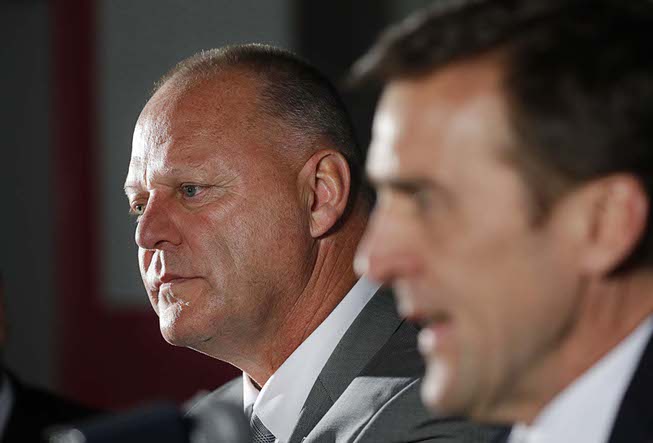 Gerard Gallant, left, listens to Vegas Golden Knights general manager ...