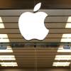 This Thursday, Sept. 19, 2013, file photo shows the Apple logo above a store location entrance, in Dallas. Apple will begin testing self-driving car technology in California, its first public move into a highly competitive field that could radically change transportation. 