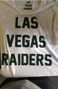 This shirt was submitted as an example of potential use of the Las Vegas Raiders mark by Nella Chunky LLC, a company based in Las Vegas. The application claims the shirt was used as early as March 2015.