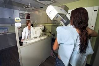 Patti Schmalhofer takes a patient's mamogram in the Nevada Health Centers Mammovan Wednesday, April 19, 2017.