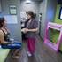 Anabel Prieto, left, gives some medical history to Lynn DeJesus  before her mammogram in the Nevada Health Centers Mammovan Wednesday, April 19, 2017.