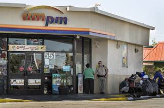 Metro investigates a stabbing at an ARCO convenience store in the 500 block of North Lamb Boulevard where a male customer was fatally stabbed and likely related to two others nearby on Wednesday, April 19, 2017.