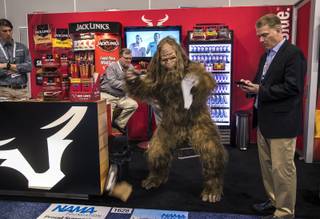Sasquatch tears up some cardboard about the Jack Link's display during the National Automatic Merchandising Association Show within the Venetian Convention Center on Thursday, April 20, 2017.