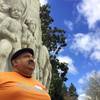 Moses Maldonado, a 50-year-old undocumented farmworker, is shown in front of a statue depicting pioneers at the Oregon Capitol in Salem, Ore. Maldonado says he is afraid he will be picked up by immigration authorities when he leaves his house to go to the fields.