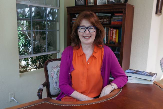 Author and Professor Laura McBride inside her home office on April 18, 2017.