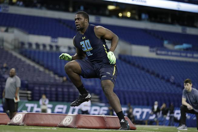 Michigan State defensive end Malik Mcdowell runs a drill at the NFL football scouting combine Sunday, March 5, 2017, in Indianapolis.