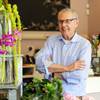 Rick McVey, owner of Dilly Lily, poses for a photo at his shop Wednesday, April 26, 2017, in Chicago. If the Trump administration's plan to lower tax rates becomes law, it will likely benefit McVey. The florist has a range of possibilities, not just from the prospect of lower taxes, but that he’d get more business from customers who have more money to spend. 