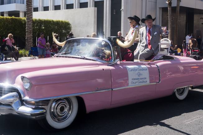 Former Mayor Oscar Goodman and current Mayor Carolyn Goodman ride in a pink cadillac during the Helldorado parade, Saturday, May 13, 2017.