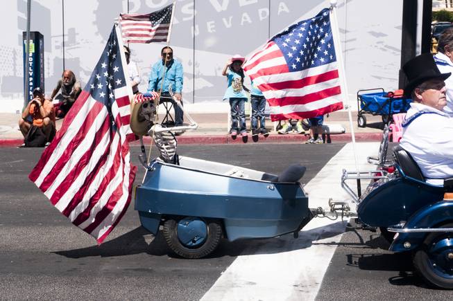Members of the Zelzah Shriners Las Vegas Legion of Honor drive by during the Helldorado parade, Saturday, May 13, 2017.