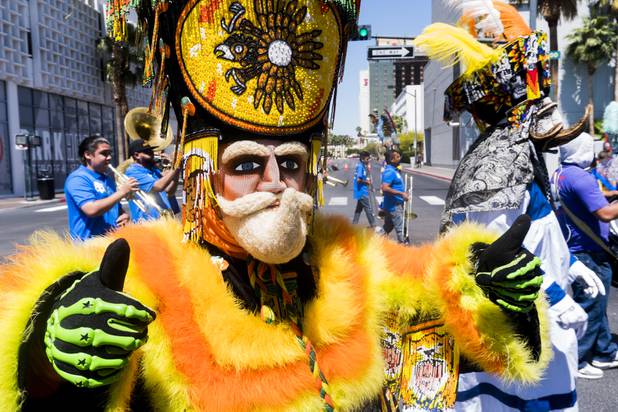 Members of the Las Vegas Fiesta Morelense and Banda Imperio perform during the Helldorado parade, Saturday, May 13, 2017.