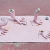 A look at the current state of Chris Bauder's "Night Eyes" installation for Clark County's Centered public art project in Las Vegas on May 17, 2017. One of the pink crocodiles is missing; the art was also vandalized last year.