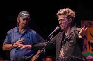 Journey keyboardist Jonathan Cain and bass guitarist Ross Valory speak with music students at the Las Vegas Academy of the Arts on May 17, 2017.