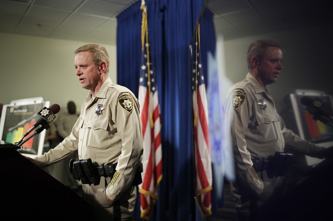 Las Vegas police Undersheriff Kevin McMahill is reflected in a ...