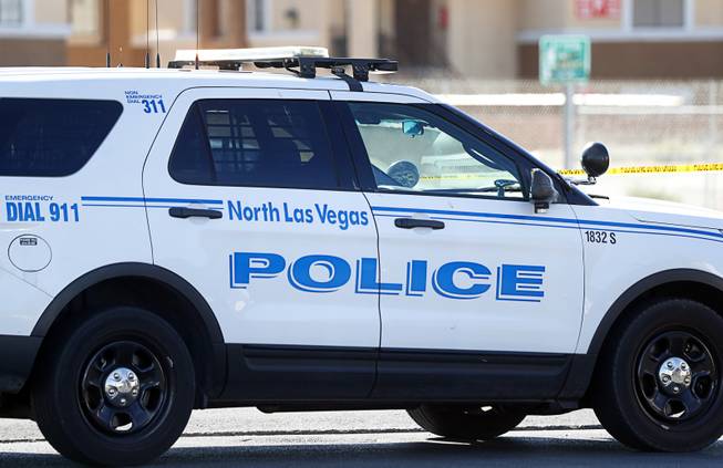 A North Las Vegas Police vehicle is shown after a shooting at a 7-Eleven convenience store at the corner of Lake Mead Boulevard and Pecos Road in North Las Vegas Monday, May 22, 2017.