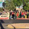 Demonstrators seeking a hike in the minimum wage to $15 an hour rally at Sahara Avenue and Paseo Del Prado on Wednesday, May 24, 2017.