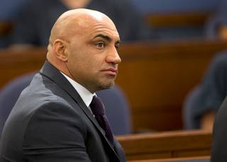 Bishop Gorman High School head football coach Kenny Sanchez sits at the defense table during his trial on domestic battery charges at the Regional Justice Center Tuesday, May 30, 2017. Sanchez was acquitted of the charges.