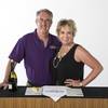 Frank and Lelia Friedlander demonstrate how their product, Tuffskin Surface Protection, defends tiles against stains from wine and citrus. 
