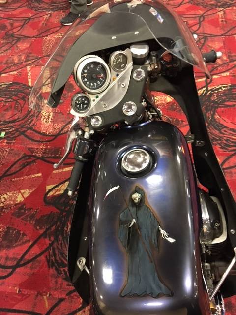 Custom artwork adorns the fuel tank of a 1971 Honda CB 750 cafe racer at the Mecum Las Vegas Motorcycle Auction. The bike is among more than 600 that go up for sale beginning Friday, June 2, 2017, at South Point Exhibit Hall.