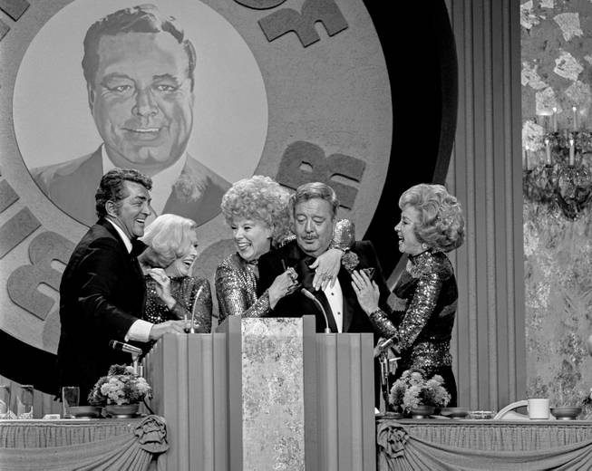 Jackie Gleason is surrounded by Dean Martin and his "The Honeymooners" co-stars, from left, Jane Kean, Sheila MacRae and Audrey Meadows during the taping of "The Dean Martin Celebrity Roast" December 17, 1974, in the Ziegfield Room at the MGM in Las Vegas. CREDIT: Don English/Las Vegas News Bureau