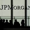 In this Monday, Oct. 21, 2013, file photo, the JPMorgan Chase logo is displayed at its headquarters in New York. 