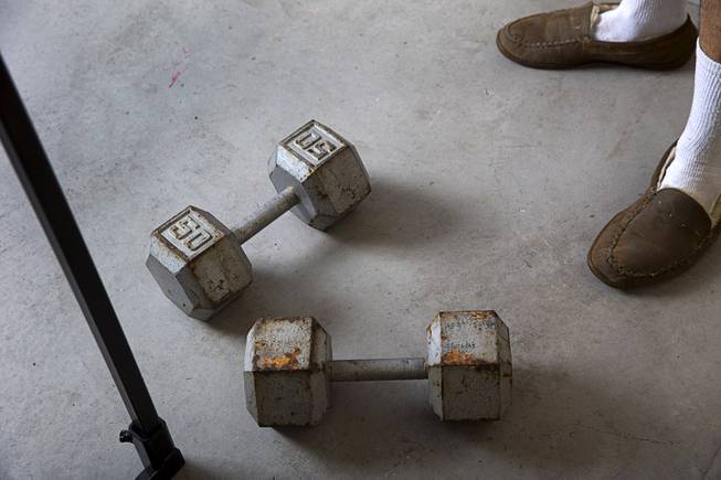 Dumbells are shown in Jeff Alexander's garage gym during a workout Sunday, June 11, 2017. Alexander is training for the World Armwrestling League Amateur Championships being held June 30 at the House of Blues in Mandalay Bay.