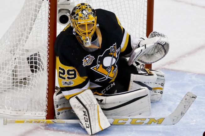 Pittsburgh Penguins goalie Marc-Andre Fleury blocks the puck during the first period of Game 2 of the Eastern Conference final against the Ottawa Senators in the NHL Stanley Cup hockey playoffs in Pittsburgh, Tuesday, May 16, 2017. The Penguins won 1-0. 