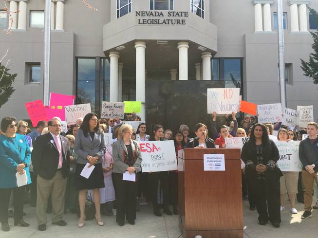 Protesters and Nevada lawmakers gather in opposition to Education Savings Accounts on March 20, 2017, in Carson City. In June, the Democrat-controlled Legislature defeated Republican Gov. Brian Sandoval's proposed $60 million in funding for ESAs.