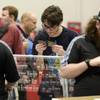 An attendee looks over cards for sale during the Magic: The Gathering Grand Prix event Thursday, June 15, 2017, at the Las Vegas Convention Center. Magic: The Gathering is a fantasy-based trading card game which is played by over 20 million people world wide and the Las Vegas grand prix event will draw an estimated 3500 for the main event.