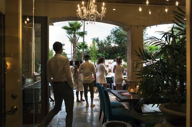 Guests gather as A Magazine co-founders Dani Bald-Bruni and Lacey Murray host an anniversary party celebrating their first year of publishing the magazine which mixes real estate, design and lifestyle content on Saturday, June 10, 2017.