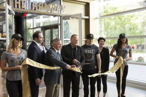 Las Vegas Golden Knights coach Gerard Gallant cuts the ceramonial ribbon during the openeing of  
