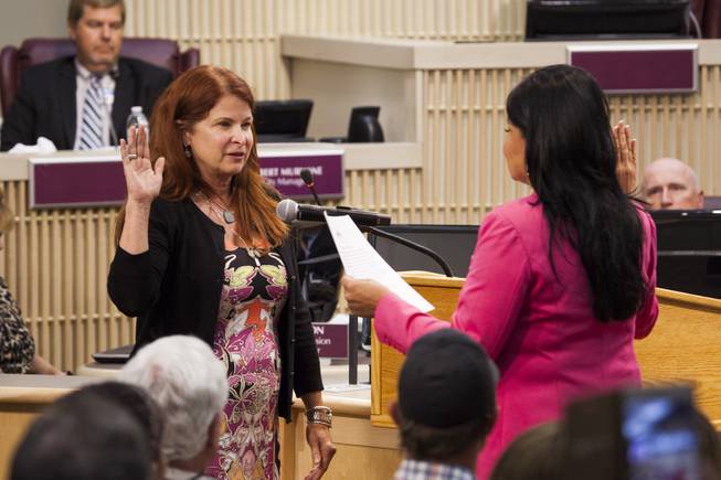 Henderson's newly elected Mayor Debra March is sworn in during a special City Council meeting at Henderson City Hall, Tuesday, June 20, 2017.