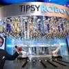 Rino Armeni, chairman of Robotic Innovations, poses by robotic bartenders in the Miracle Mile Shops at Planet Hollywood Monday, June 26, 2017. The in the Tipsy Robot automated bar is scheduled to open on Friday, he said.