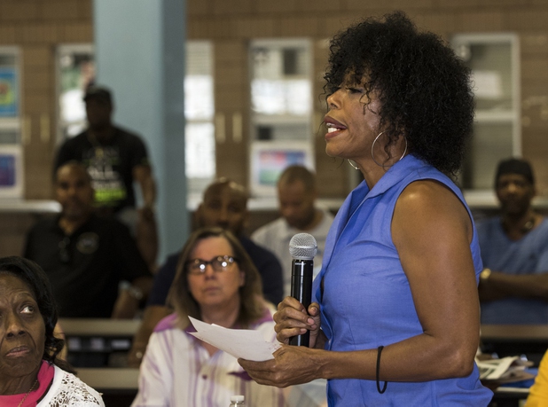 Dominic Archibald poses a question for the board as the local chapter of the NAACP sponsors an info session and discussion on Nevada's legal process when someone is killed held at West Prep Academy on Friday, June 23, 2017.