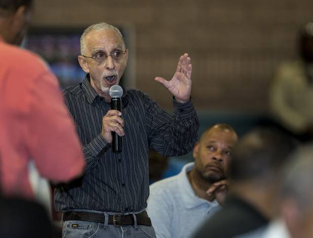 Longtime civil rights advocate Gary Peck poses a question for the board as the local chapter of the NAACP sponsors an info session and discussion on Nevada's legal process when someone is killed held at West Prep Academy on Friday, June 23, 2017.