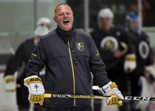 The Golden Knights head coach Gerard Gallant shares a lighter moment as they hold their first on ice practice during their inaugural Development Camp at the Las Vegas Ice Center on Tuesday, June 27, 2017.