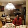In this Nov. 9, 2015, file photo, Pastor Yul Dorn poses for a portrait inside his home, where he was facing eviction due to foreclosure in San Francisco's Bayview-Hunters Point district. Dorn and his wife expect to join the growing ranks of African-Americans who do not own their homes, a rate that was nearly 30 percentage points higher than that of whites in 2016, according to a report by Harvard University's Joint Center for Housing Studies. 