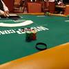 A stack of $50,000 tournament chips await a poker player before the start of the 2017 World of Series of Poker Main Event at the Rio Convention Center on Saturday, July 8, 2017.