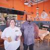 Laura and Michael Harris owners of Tennesseasonings pose for a photo inside their restaurant. 
