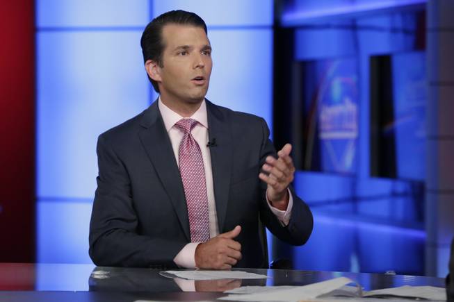 Donald Trump Jr. is interviewed by host Sean Hannity on his Fox News Channel television program, in New York Tuesday, July 11, 2017.