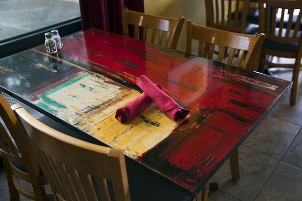A hand-painted table by Ann Alenik is shown at the Pasta Shop Ristorante & Art Gallery, 2525 W Horizon Ridge Parkway, in Henderson Monday, July 10, 2017.
