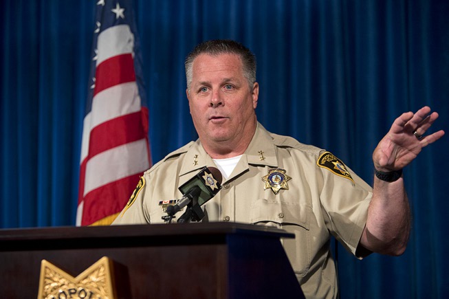 Metro Police Assistant Sheriff Todd Fasulo responds to a reporter's ...