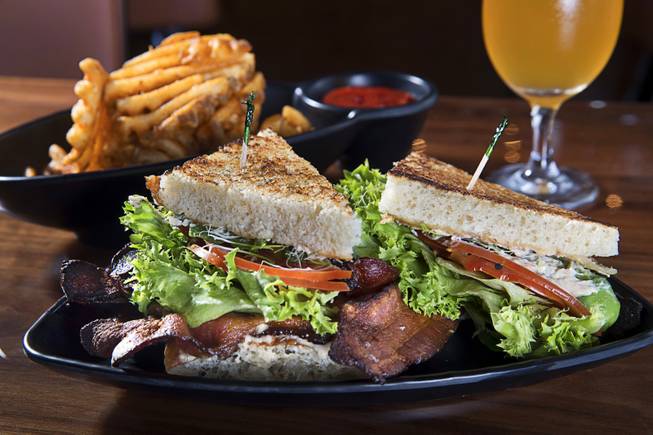 The BBBLT (bacon, bacon, bacon, lettuce and tomato) sandwich at the Kitchen at Atomic in downtown Las Vegas Thursday, July 13, 2017.