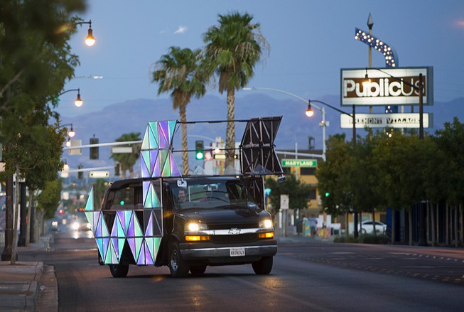 The Dragon Art Car is shown on East Fremont Street ...