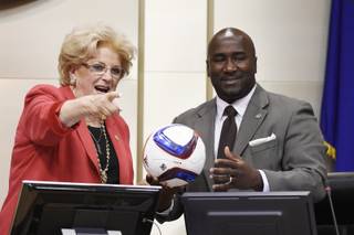 Las Vegas Mayor Carolyn Goodman and Councilman Ricki Barlow joke with a soccer ball during a meeting of the Las Vegas City Council Wednesday, July 19, 2017.
