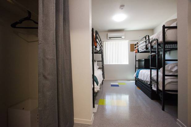A bedroom that can house up to four people is seen during the grand opening ceremony of the new Shannon West Homeless Youth Center, Friday, July 14, 2017.