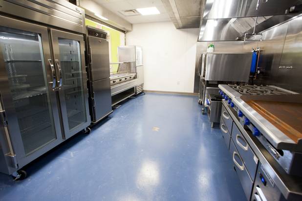 The kitchen area is seen during the grand opening ceremony of the new Shannon West Homeless Youth Center, Friday, July 14, 2017.