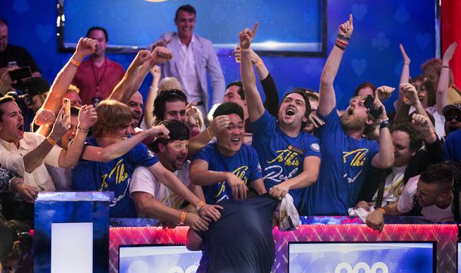 WSOP player Scott Blumstein collapses before his joyous supporters after winning poker's world championship for $8.15 Million at the Rio on Sunday, July 23 2017.